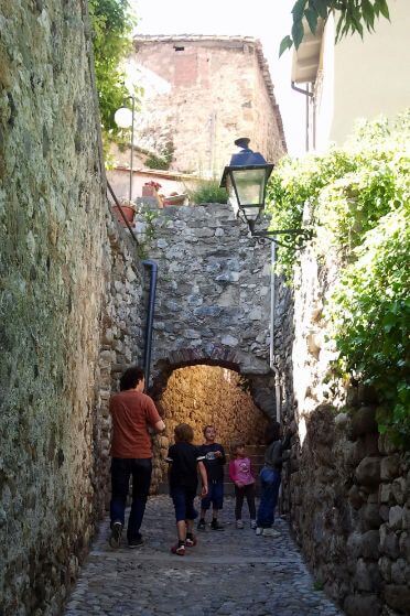 Family on a day trip from Barcelona to Besalu and Girona with us