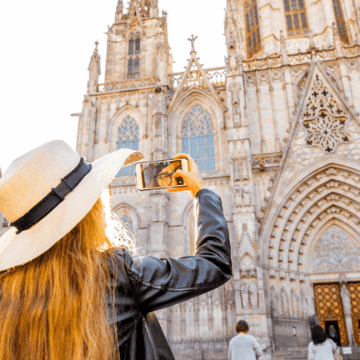 Lady taking a picture of La Seu cathedral
