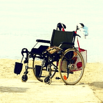 Wheelchair in a Barcelona beach