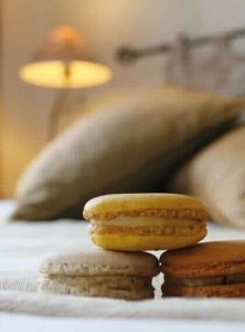 Macaroons in hotel bed