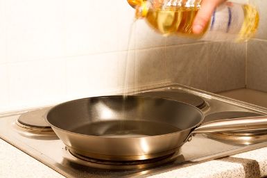 Heating oil to fry fritters batter