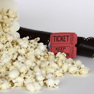 Popcorn, movie ticket and film