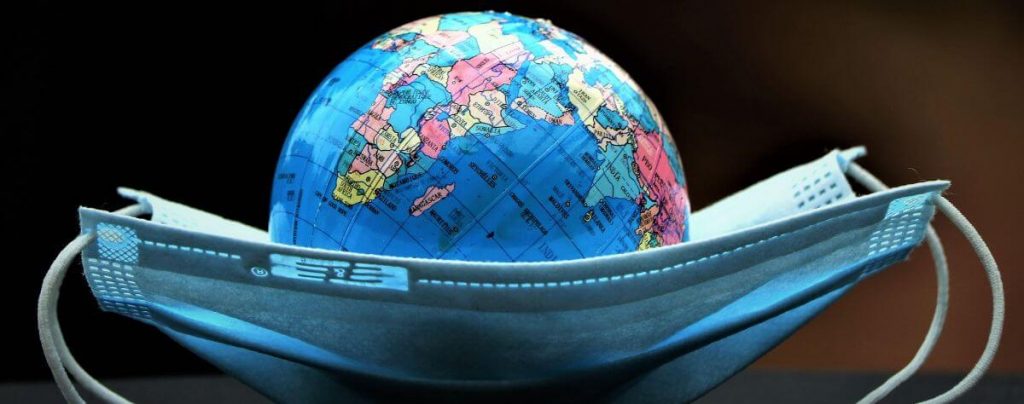 Toy globe and face mask