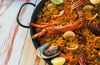 Paella is a lunch food in Spain